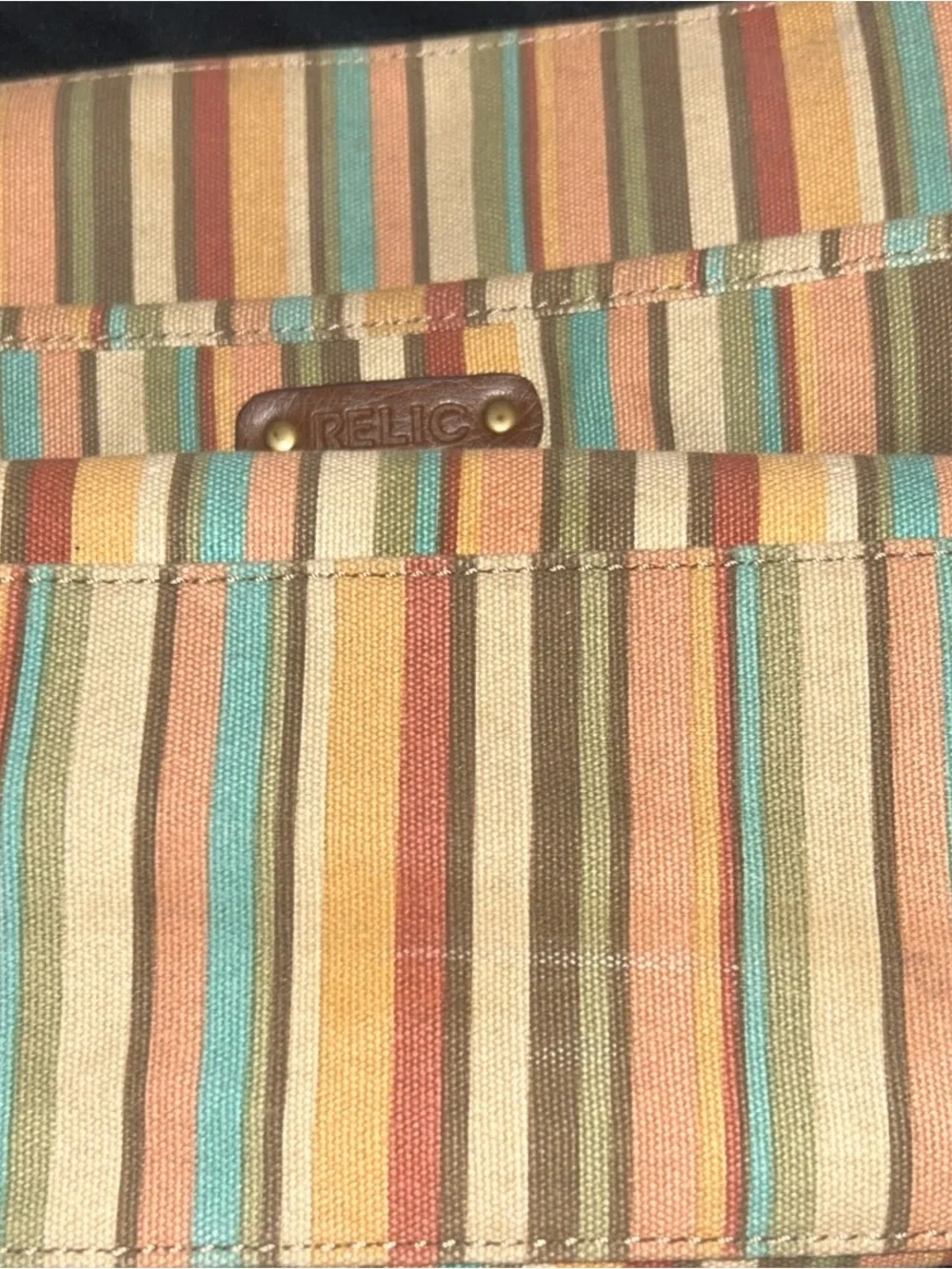 Relic Messenger canvas crossbody Bag In A Beautiful Striped Pattern.